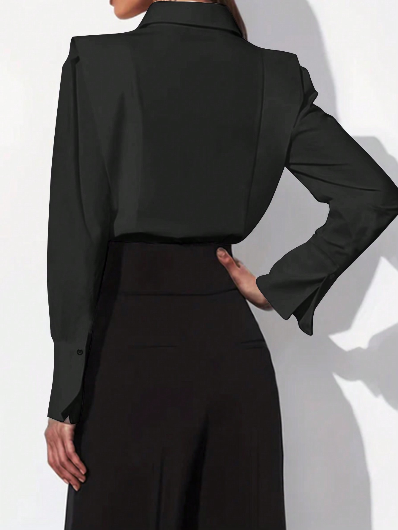 Zwarte damesblouse met schoude - Shoulder Pad Set In recensie en prijs